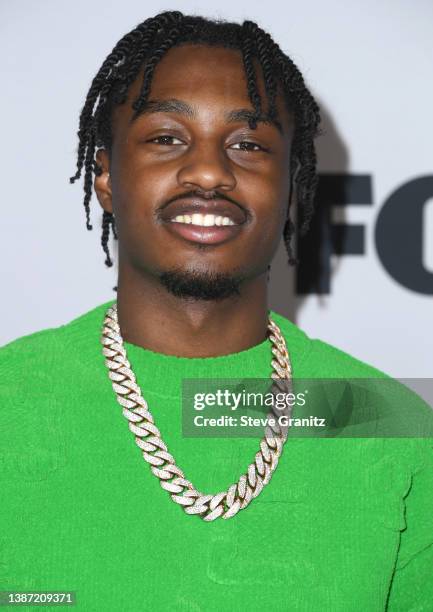 Lil Tjay arrives at the 2022 iHeartRadio Music Awards at Shrine Auditorium and Expo Hall on March 22, 2022 in Los Angeles, California.