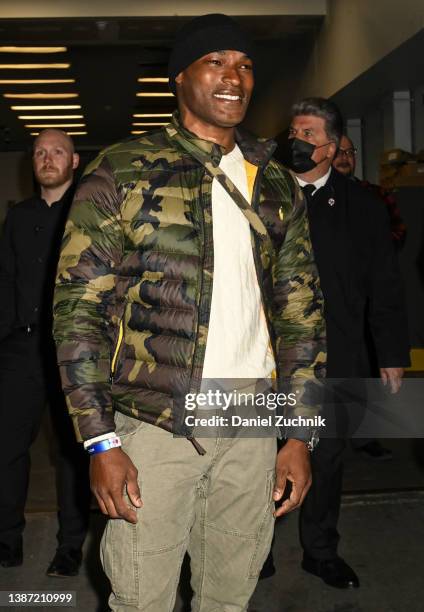 Model Tyson Beckford is seen wearing a camo puff coat outside the Ralph Lauren AW22 show on March 22, 2022 in New York City.