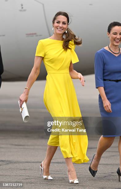 Catherine, Duchess of Cambridge arrives with Prince William, Duke of Cambridge at Norman Manley International Airport to visit Jamaica as part of...