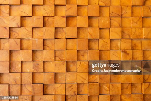 abstract orange wood blocks background wall - block stock-fotos und bilder
