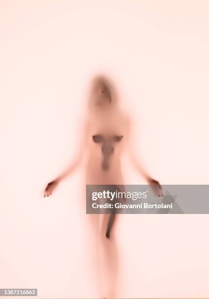 woman body behind the veil, blurred silhouette in backlight - xray photography stock pictures, royalty-free photos & images