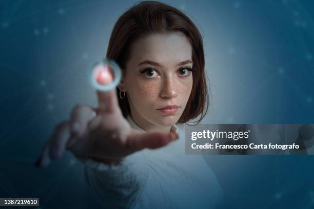 woman  touching power button - one off stock pictures, royalty-free photos & images