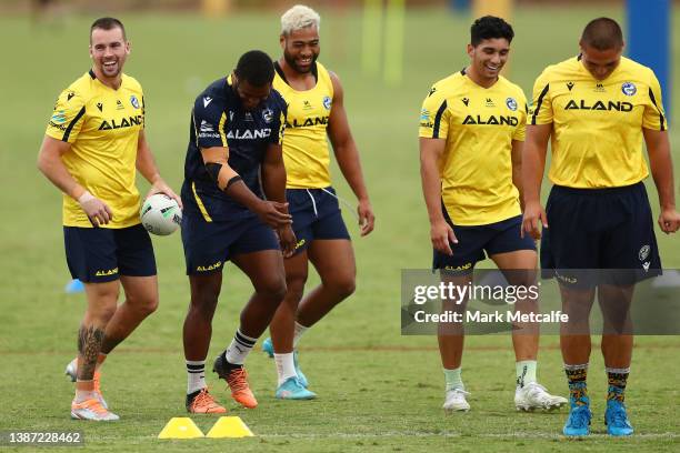 Clint Gutherson of the Eels and Makahesi Makatoa of the Eels smile during a Parramatta Eels NRL training session at Kellyville Park on March 23, 2022...