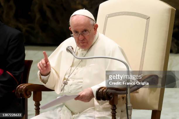 Pope Francis attends his weekly general audience at the Paul VI Hall on March 23, 2022 in Vatican City, Vatican. Addressing the Italian Parliament...