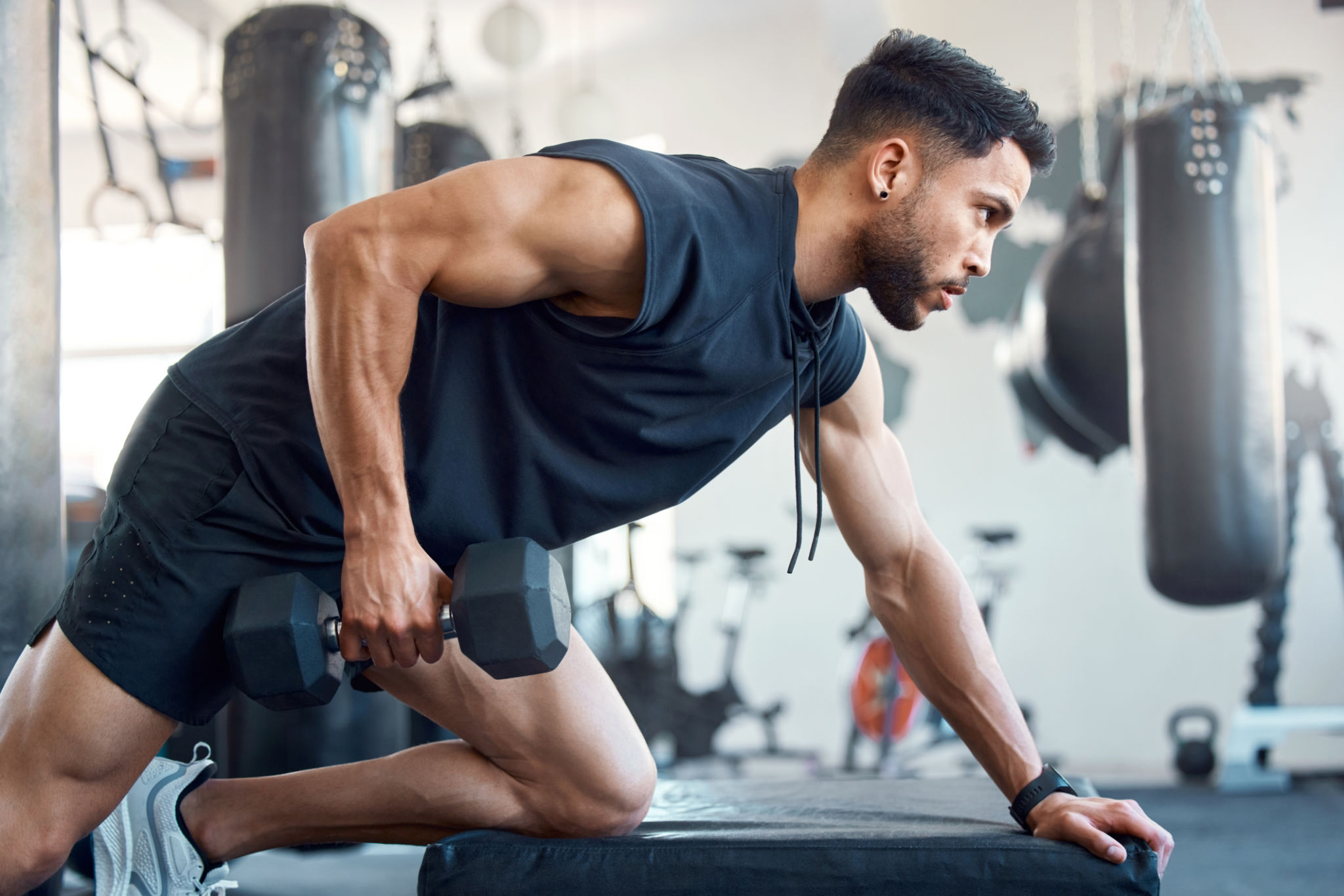 man lifting weights