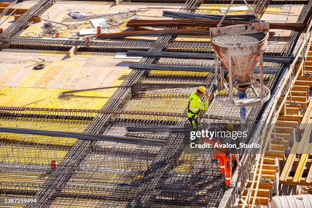 concrete pouring bucket for crane - metal bucket stock pictures, royalty-free photos & images