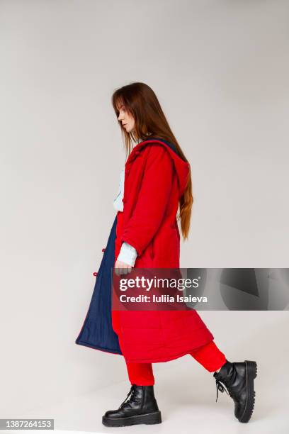 stylish woman walking and looking away - woman full body isolated stock pictures, royalty-free photos & images