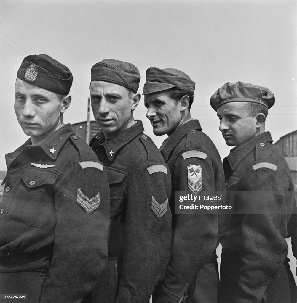 Four Italian Prisoners Of War Posed Wearing Military Uniform At A Pow...  News Photo - Getty Images