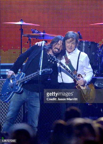Musicians Dave Grohl and Sir Paul McCartney perform onstage at the 2012 MusiCares Person of the Year Tribute to Paul McCartney held at the Los...