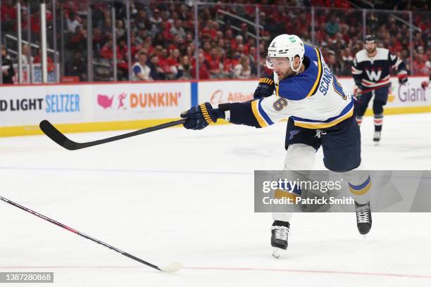 Marco Scandella of the St. Louis Blues shoots against the Washington Capitals during the first period at Capital One Arena on March 22, 2022 in...