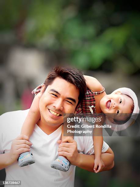 father and daughter having fun - philippines family stock pictures, royalty-free photos & images