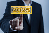 finger tip touching on 2025 year keyword