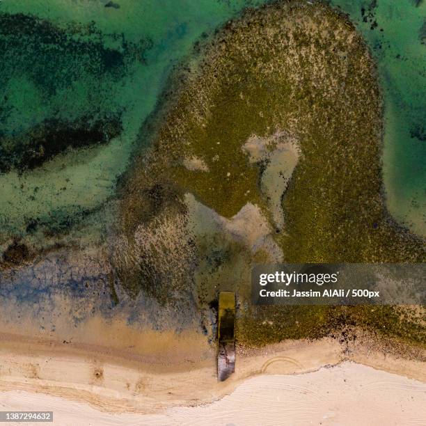 aerial view of beach and water with dock,kuwait city,kuwait - persian gulf countries stock pictures, royalty-free photos & images