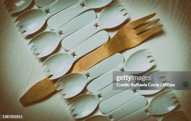 otherwise hungry,high angle view of eating utensils on table - raffaele corte stockfoto's en -beelden