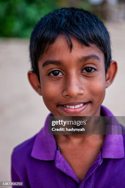 sri lankan young boy posing on the beach, ceylon - sri lankan culture stock pictures, royalty-free photos & images