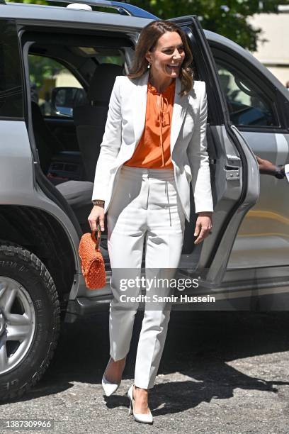 Catherine, Duchess of Cambridge and Prince William, Duke of Cambridge arrive for a visit to Shortwood Teacher's College on March 23, 2022 in...