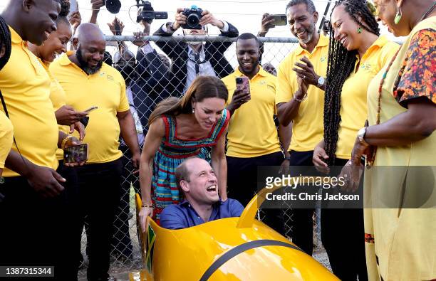 Prince William, Duke of Cambridge and Catherine, Duchess of Cambridge meet the Jamaican Bobsleigh team in Trench Town on day four of the Platinum...