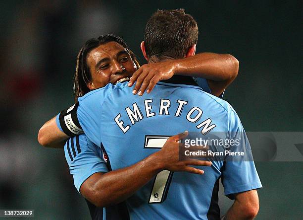 Nick Carle and Brett Emerton of Sydney celebrate after during the round 19 A-League match between Sydney FC and Perth Glory at Sydney Football...