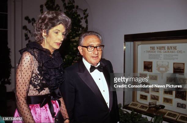 Married couple, philanthropist Nancy Kissinger and former US Secretary of State Henry Kissinger, arrive at the White House for the State Dinner ,...