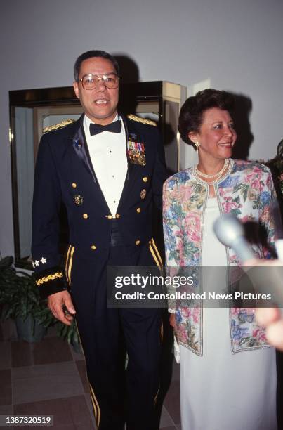 Married American couple, Chairman of the Joint Chiefs of Staff Army General Colin L Powell and audiologist Alma Powell, arrive at the White House for...