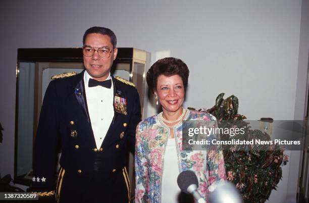 Married American couple, Chairman of the Joint Chiefs of Staff Army General Colin L Powell and audiologist Alma Powell, arrive at the White House for...