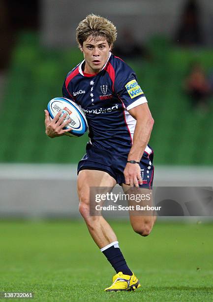 James O'Connor of the Rebels makes a break during the Super Rugby trial match between the Melbourne Rebels and the Auckland Blues at AAMI Park on...