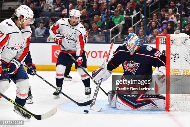 Goaltender Elvis Merzlikins of the Columbus Blue Jackets defends the net during the second period of a game against the Washington Capitals at...