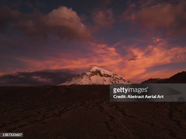 snowcapped mountain at sunset photographed from a low angle point of view, bolivia - latin america landscape stock pictures, royalty-free photos & images