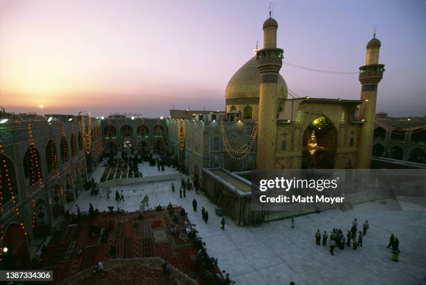 Shelled during the failed anti-Sadam uprising of 1991, and used as a base by insurgents fighting the US in August, the Imam Ali Shrine, one of the...