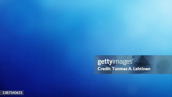 Abstract blue halftone pattern on blurred blue color gradient background. Abstract blue halftone pattern on blurred blue color gradient background.
