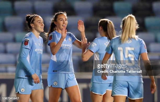 Lucy Bronze, Caroline Weir, Georgia Stanway and Lauren Hemp of Manchester City celebrate after Simone Magill of Everton scored an own goal to make it...