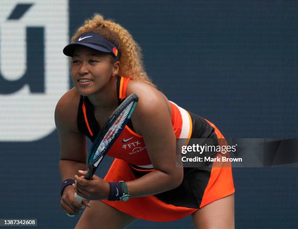 Naomi Osaka of Japan awaits the serve from Astra Sharma of Australia during the 2022 Miami Open presented by Itaú at Hard Rock Stadium on March 23,...