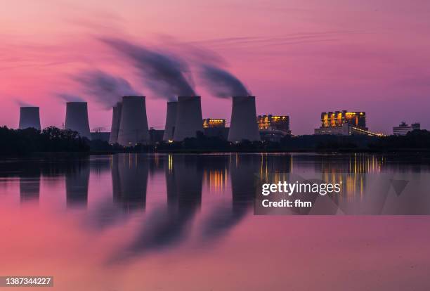 coal fired power station jänschwalde at sunset (brandenburg, germany) - kühlturm stock-fotos und bilder