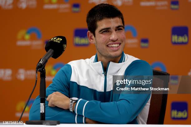 Carlos Alcaraz of Spain fields questions from the media at a press conference during the Miami Open at Hard Rock Stadium on March 23, 2022 in Miami...