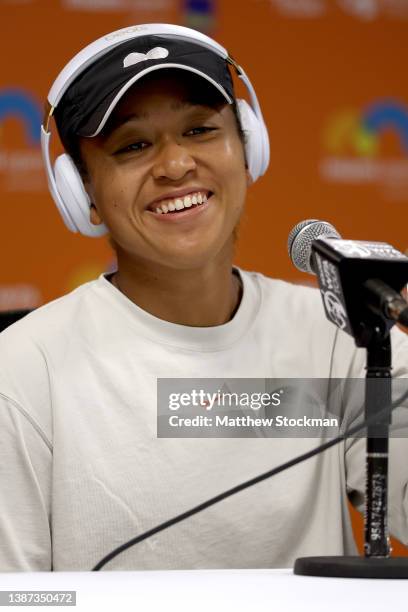 Naomi Osaka of Japan fields questions from the media at a press conference during the Miami Open at Hard Rock Stadium on March 23, 2022 in Miami...