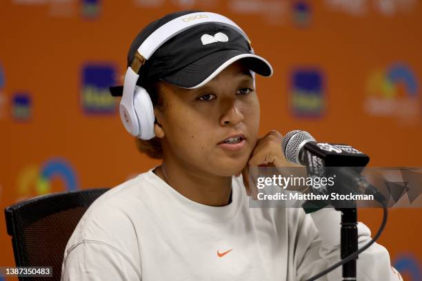 Naomi Osaka of Japan fields questions from the media at a press conference during the Miami Open at Hard Rock Stadium on March 23, 2022 in Miami...