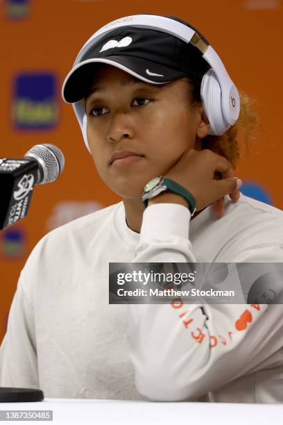 Naomi Osaka of Japan fields questions from the media at a press conference during the Miami Open at Hard Rock Stadium on March 23, 2022 in Miami...