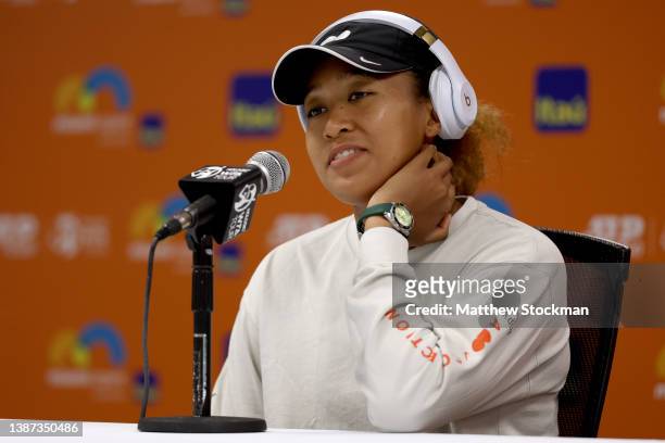 Naomi Osaka of Japan fields questions from the media at a press conference during the Miami Open at Hard Rock Stadium on March 23, 2022 in Miami...