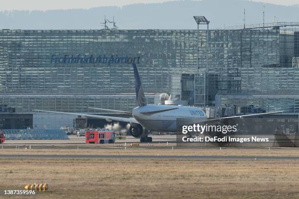 Frankfurt, Germany, : A United Airlines airplane taxiing over the airfield at Airport Frankfurt on March 22, 2022 in Frankfurt, Germany.