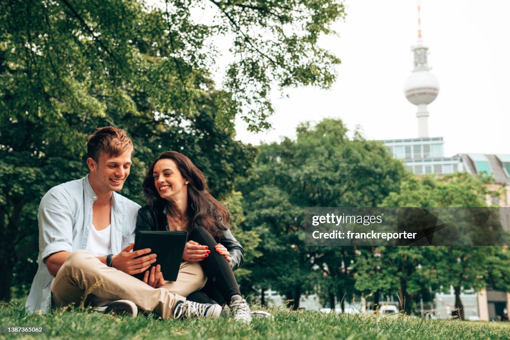 Couple resting together at the park