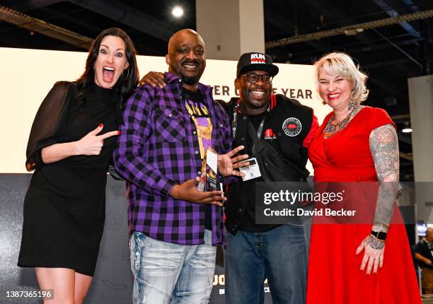 Josh Davis poses with Eugene Samuel, Mia Mastroianni and Molly Wellman after winning the award for Bartender of the Year for Brown & Balanced at the...