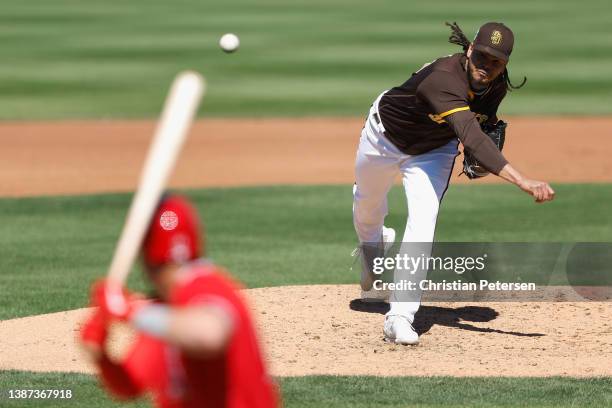 Relief pitcher Dinelson Lamet of the San Diego Padres pitches against the Los Angeles Angels during the fourth inning of the MLB spring training game...