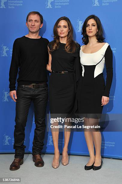 Actor Goran Kostic, director Angelina Jolie and actress Zana Marjanovic attend the "In The Land Of Blood And Honey" Photocall during day three of the...