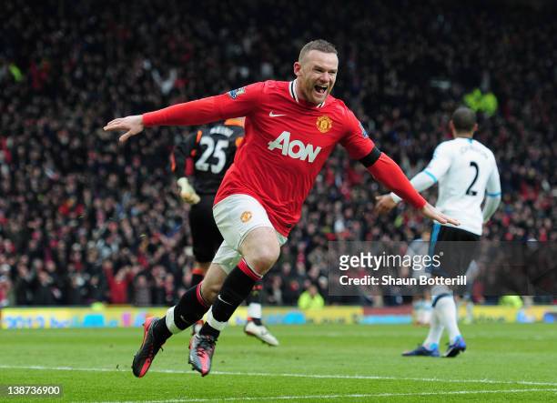 Wayne Rooney of Manchester United celebrates scoring his second goal during the Barclays Premier League match between Manchester United and Liverpool...