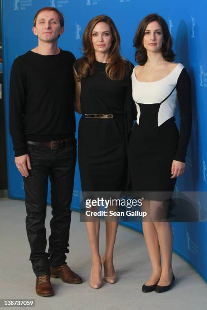 Actor Goran Kostic, director Angelina Jolie and actress Zana Marjanovic attend the "In The Land Of Blood And Honey" Photocall during day three of the...