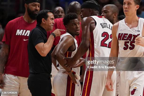 Head Coach Erik Spoelstra of the Miami Heat yells at Jimmy Butler during a time out in the second half against the Golden State Warriors at FTX Arena...