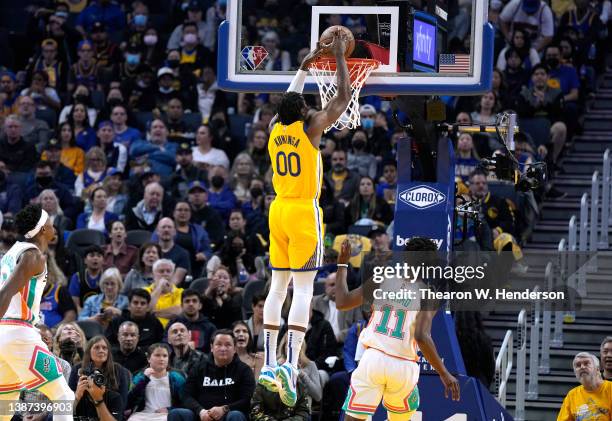 Jonathan Kuminga of the Golden State Warriors slam dunks against the San Antonio Spurs in the fist half of an NBA basketball game at Chase Center on...