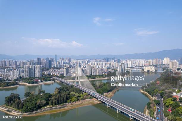 cable stayed bridge and urban landscape, fuzhou, china - fuzhou fotografías e imágenes de stock
