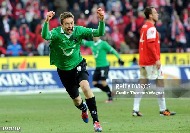 Artur Sobiech of Hannover celebrates after scoring his teams first goal during the Bundesliga match between FSV Mainz 05 and Hannover 96 at Coface...
