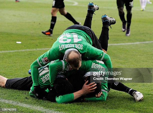 Players of Hannover celebrates after Artur Sobiech is scoring his teams first goal during the Bundesliga match between FSV Mainz 05 and Hannover 96...
